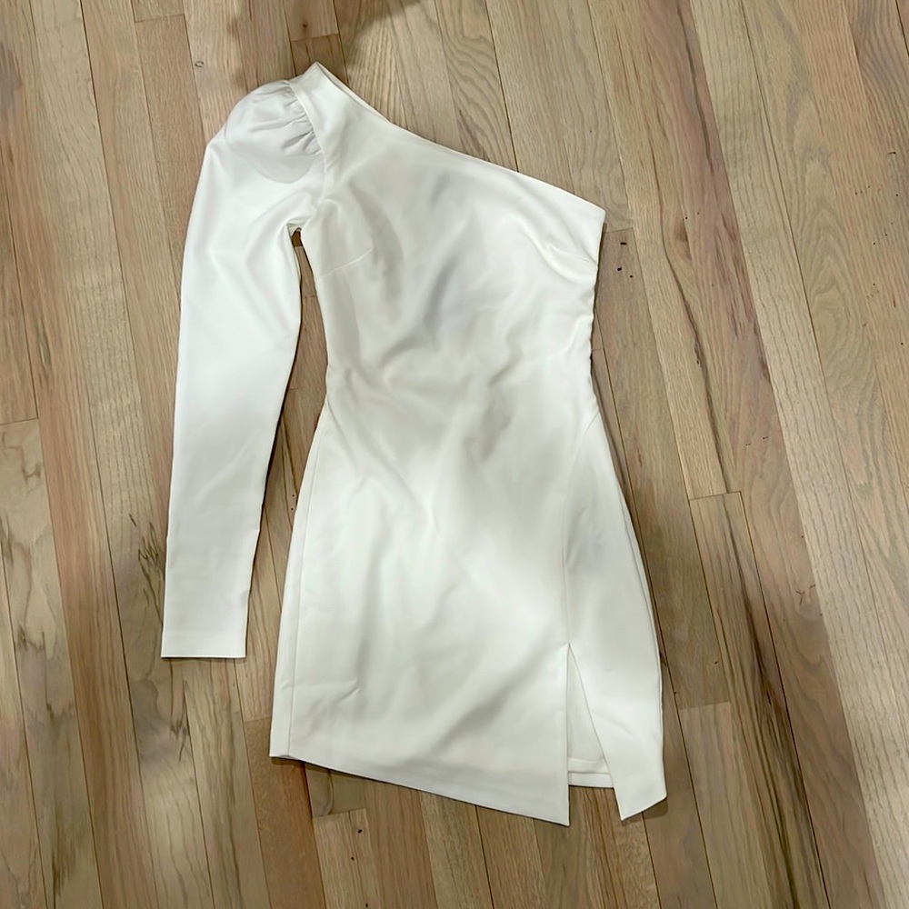 Never worn, unable to be returned to Revolve (past their return policy date).